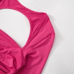 Detail of rose red mini dress featuring stylish cut-out design and premium stitching