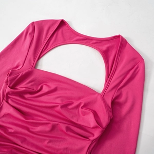 Close-up of rose red top with unique hollow-out neckline and ruched fabric detail