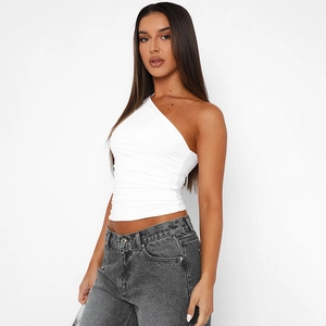Detail of white one-shoulder slim fit tank top with pleated side and elastic fabric texture