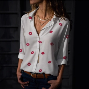 Elegant white long sleeve button-down shirt featuring red lip prints and a lapel V-neckline