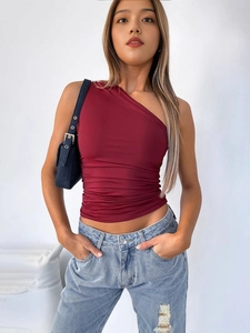 Women's burgundy one-shoulder sleeveless top with elegant ruched side detailing