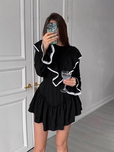 Elegant black long sleeve dress with white ruffle lace trim and high waist design