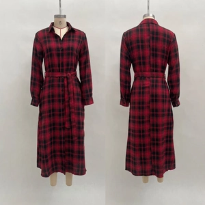 Detail view of red and black plaid shirt dress with waist belt showing front and back