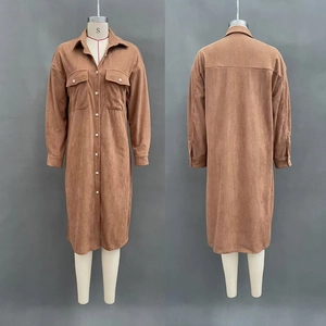 Detailed front and back views of brown corduroy shirt dress with workwear flap pockets