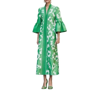 Elegant green maxi dress with white floral print and stylish ruffled bubble sleeves