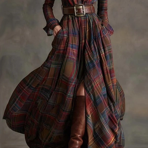 Close-up of vintage plaid dress with a wide brown leather belt and metallic buckle