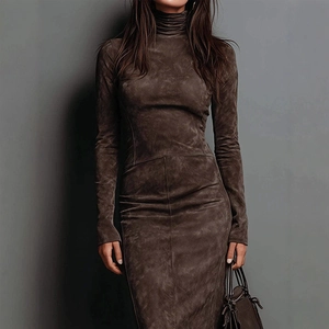 Detail of dark brown mock neck dress showing soft suede-like texture and slim fit design