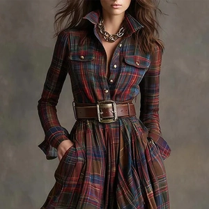 Detail view of vintage plaid maxi dress with long sleeves and wide leather belt with buckle