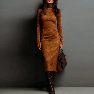 Detail of slim-fit brown suede dress with elegant long sleeves and turtle neck