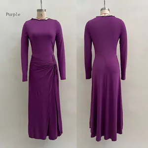 Detail view of purple knitted dress showing waist knot design and side slit on mannequin