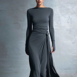 Detail showing the elegant waist twist knot and thumbhole cuffs on dark grey dress