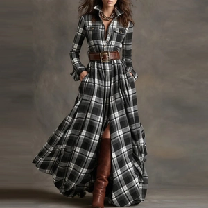 Detailed view of plaid shirt dress with long sleeves and brown leather belt