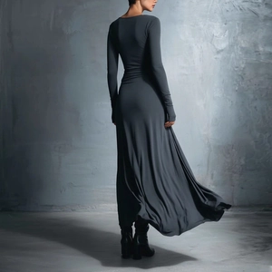 Detail of charcoal grey long sleeve maxi dress with slim fit waist and flowy skirt