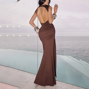Detailed back view of sleek deep brown backless maxi dress with elegant pleats