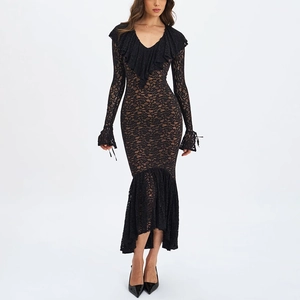 Detail of elegant black lace texture and ruffled V-neck on long sleeve mermaid dress