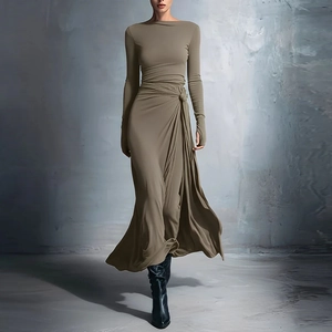 Taupe long sleeve wrap maxi dress with side knot and slit in minimalist studio setting