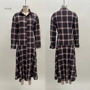 Front and back view of a black plaid long sleeve shirt dress on a mannequin display