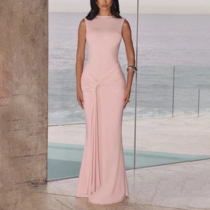 Detail view of pink sleeveless evening dress featuring an elegant knot and pleated waist draping