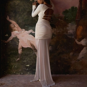 Slim fit backless long sleeve maxi dress in off-white with side ruffles and sheer mesh hem