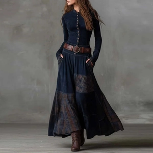 Detail of vintage patchwork maxi dress with a brown faux leather belt and metal buckle