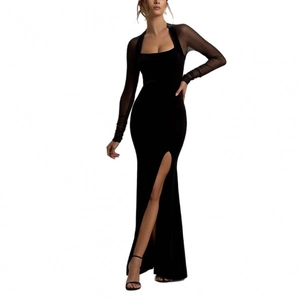 Slim fit black velvet evening dress with high slit, square neck and sheer mesh long sleeves