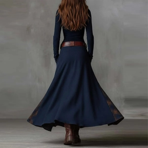 Rear view of vintage high-waisted navy dress with brown plaid patchwork details