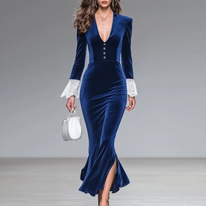 Detail of elegant V-neck velvet dress featuring delicate white lace cuffs and front buttons