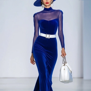 Elegant long-sleeved navy velvet dress with sheer mesh splicing and a sparkling waist belt
