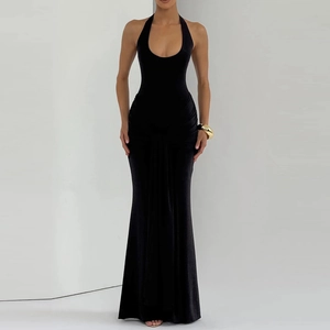Detailed view of elegant black halter neck dress with pleated waist and fishtail hemline