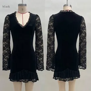 Detail of elegant black V-neck dress featuring delicate rose pattern lace sleeves and trim