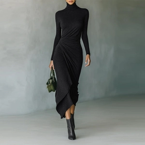 Elegant black long-sleeve dress featuring turtleneck, waist ruching and irregular hemline