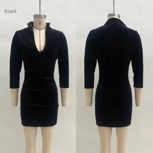 Detail view of black velvet slim fit dress with deep V-neck and ruched side stitching