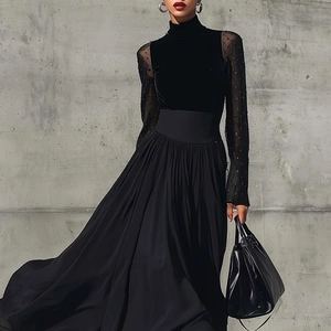 Robe longue noire élégante avec manches en tulle perlé et large taille élastique ajustée