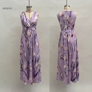 Front and back detail of a purple tulip print sleeveless V-neck maxi dress on model