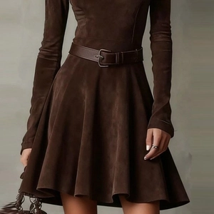 Detailed view of dark brown suede dress featuring a matching waist belt and metal buckle