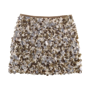 Detailed view of high-waist sequin mini skirt with earth-tone palettes and satin waistband