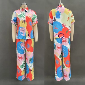 Detail view of colorful ocean animal print leisure set with sea horse and lobster motifs