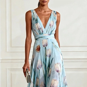 Detail of the blue tulip floral print dress with a deep V-neck and wrap waist design