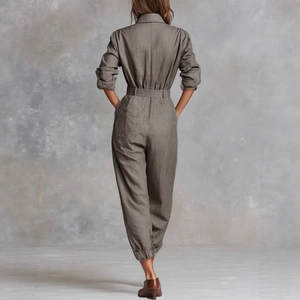 Rear view detail of dark khaki long sleeve jumpsuit with waist belt and collar