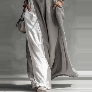 Detail of grey and white contrast casual wide-leg jumpsuit with functional side pockets