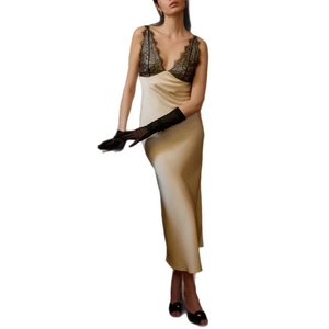 Champagne satin maxi slip dress with black lace trim and elegant V-neckline style