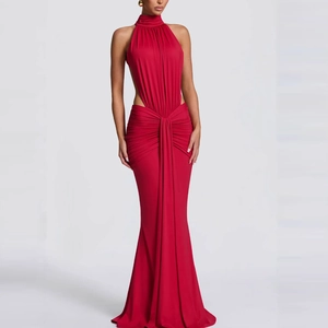 Close-up detail of the red halter neck evening dress with ruching and waist cut-outs