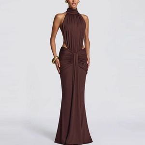 Detail of waist cut-out and draped pleats on this dark brown halter evening gown