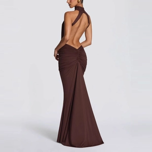 Detailed back view of dark brown halter neck dress with open back and ruching details