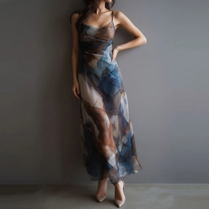 Detailed side view of mesh maxi dress with blue ink wash print and thin straps