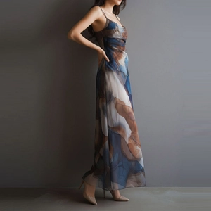 Detail of sheer mesh dress with abstract ink print and elegant slim fit straps