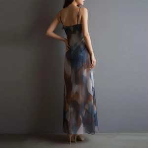 Detailed view of the backless mesh maxi dress with abstract ink pattern and thin straps