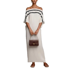 Off-shoulder cream maxi dress with striped sleeves for relaxed summer vacation style