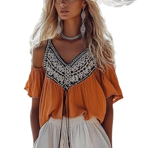 Bohemian V-neck sleeveless top in vintage brick orange with geometric embroidery details