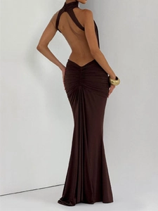 Detailed back view of chocolate halter neck gown with elegant ruching and open back